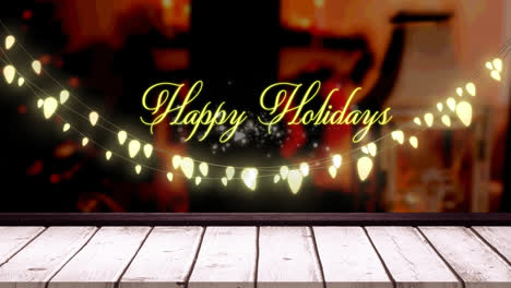 Animation-of-fairy-lights-and-happy-holidays-text-over-wooden-boards