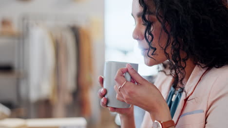 Woman,-boxes-and-reading-with-coffee-by-laptop