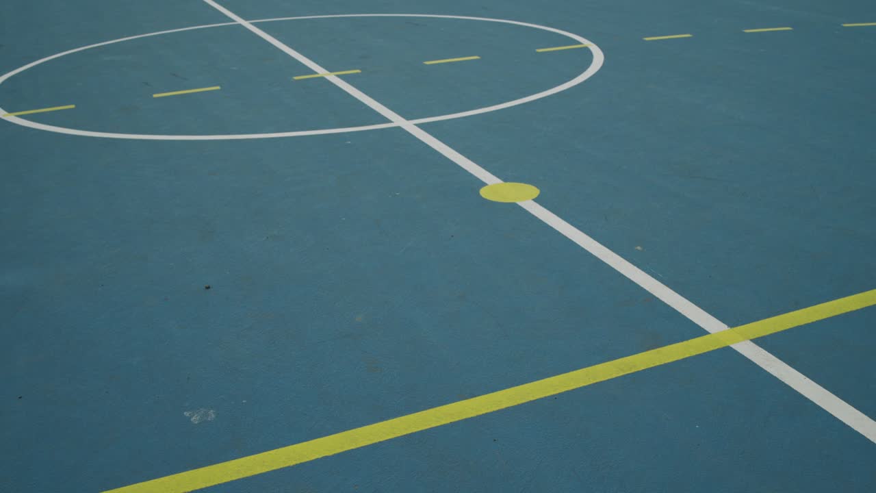 Lines and circles on asphalt athletic playground floor