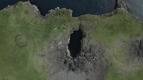 aerial of natural stone bridge at coast of arnarstapi on snæfellsnes peninsula