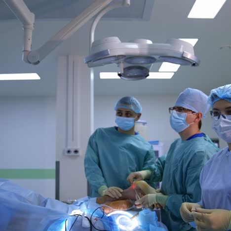 group of surgeons at work