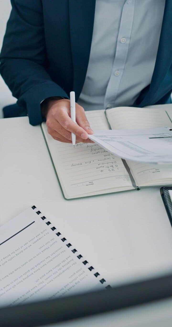 Business Professionals Collaborating on Documents in an Office