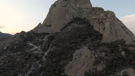 PeÃ±a-de-Bernal---Largest-Monolith-In-Mexico-Located-In-Bernal,-Queretaro---aerial-drone-shot