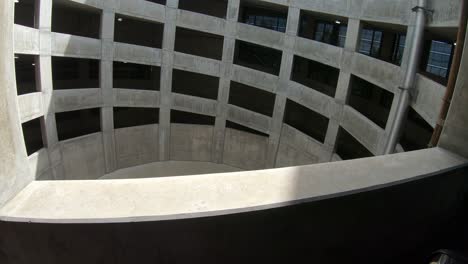 Upward around and around in a spiral parking garage