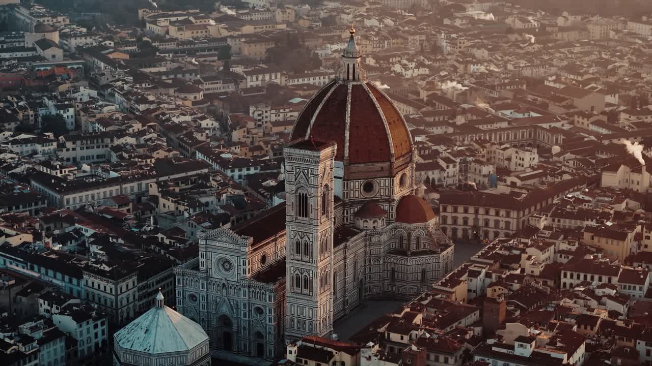 Lower orbit right around Florence Duomo dome with golden morning light