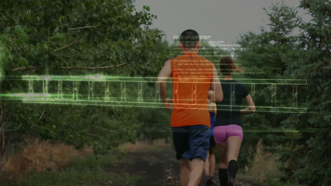 Group runners running along forest trail showing green orange digital overlays and code text