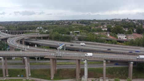 drone shot tracking train through industrial estate 01