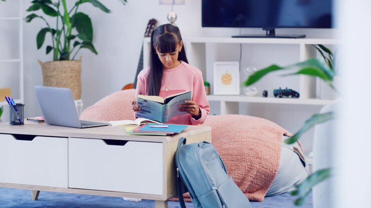 Young student studying at home for an exam