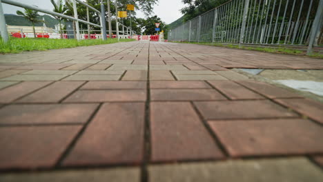 Expressive-Pov:-Close-Up-Slow-Motion-Movement,-Touching-Grass-and-Pavement