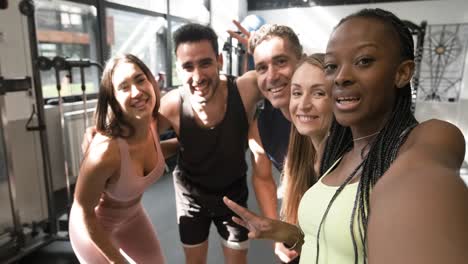 friends taking a selfie at the gym