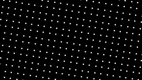 graphic pattern in black and white with stroboscopic and hypnotic effect, while rotating clockwise and increasing in size.