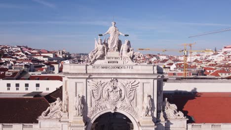 Arco-da-Rua-Augusta-Lisbon-Portugal-filmed-close-up-by-drone-on-a-bright-sunny-day-in-winter