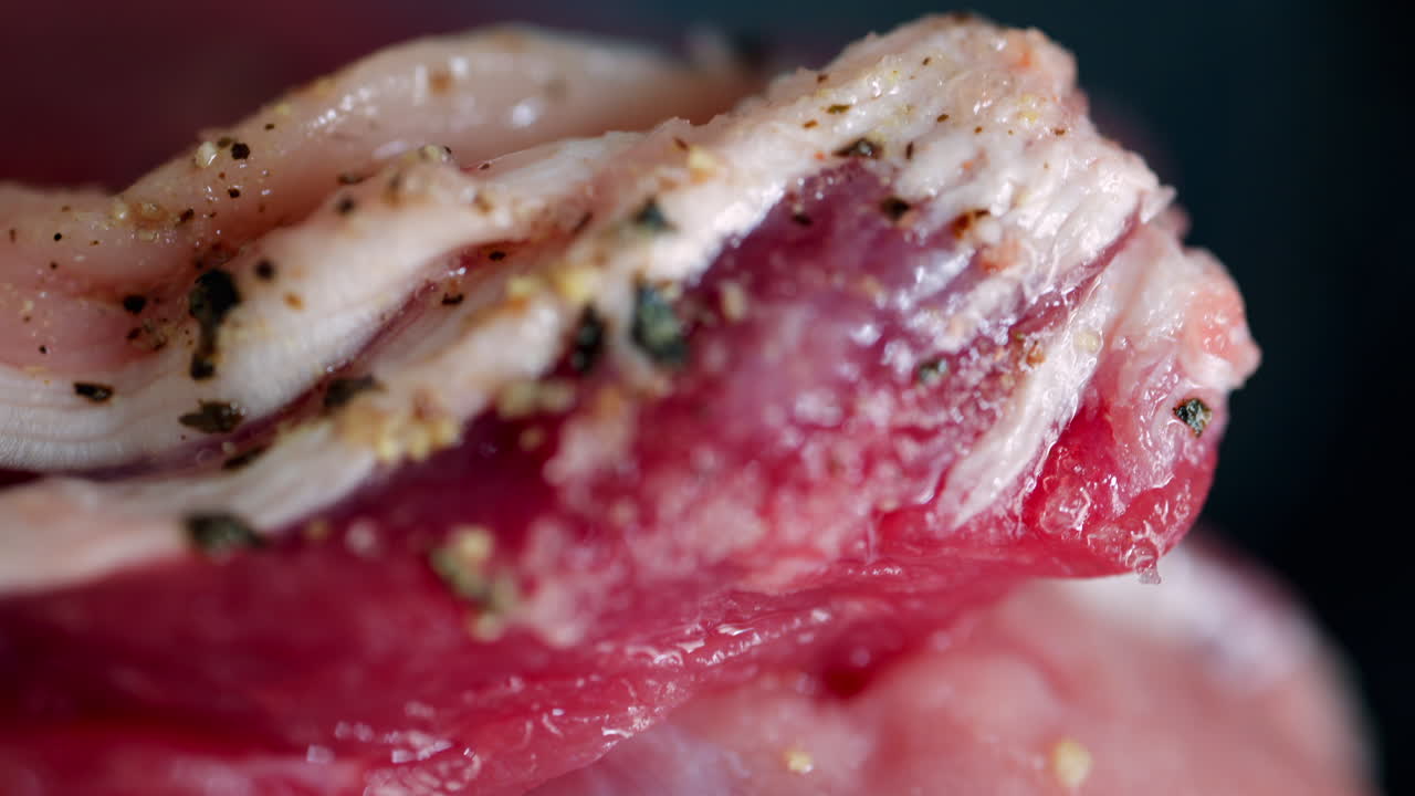 Close up of a rump steak cooking on a pan