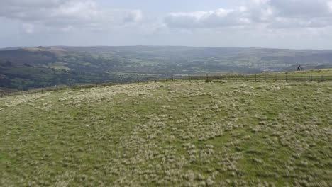 drone shot sweeping across mam tor 02