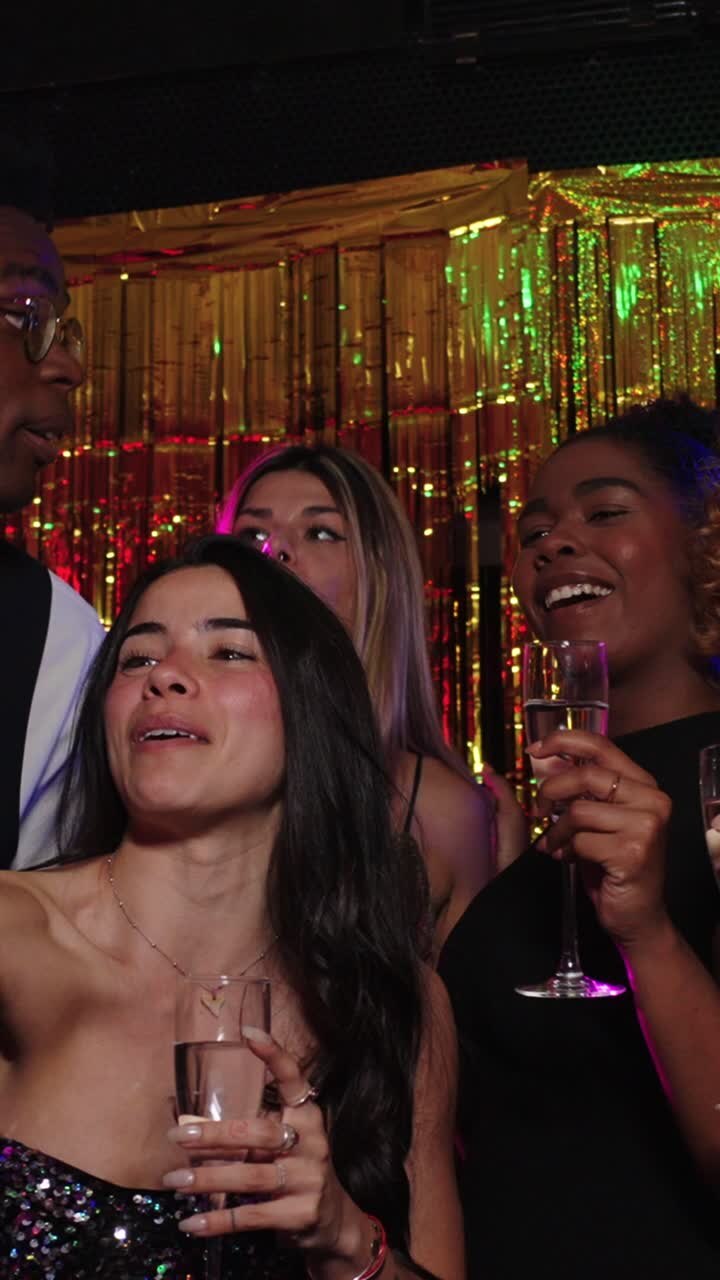 Friends celebrating with champagne at a party