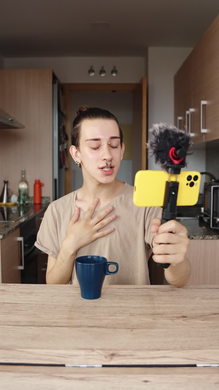 Man vlogging in the kitchen