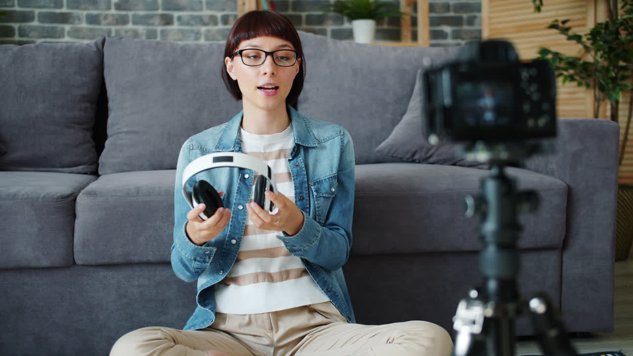 Woman reviewing headphones