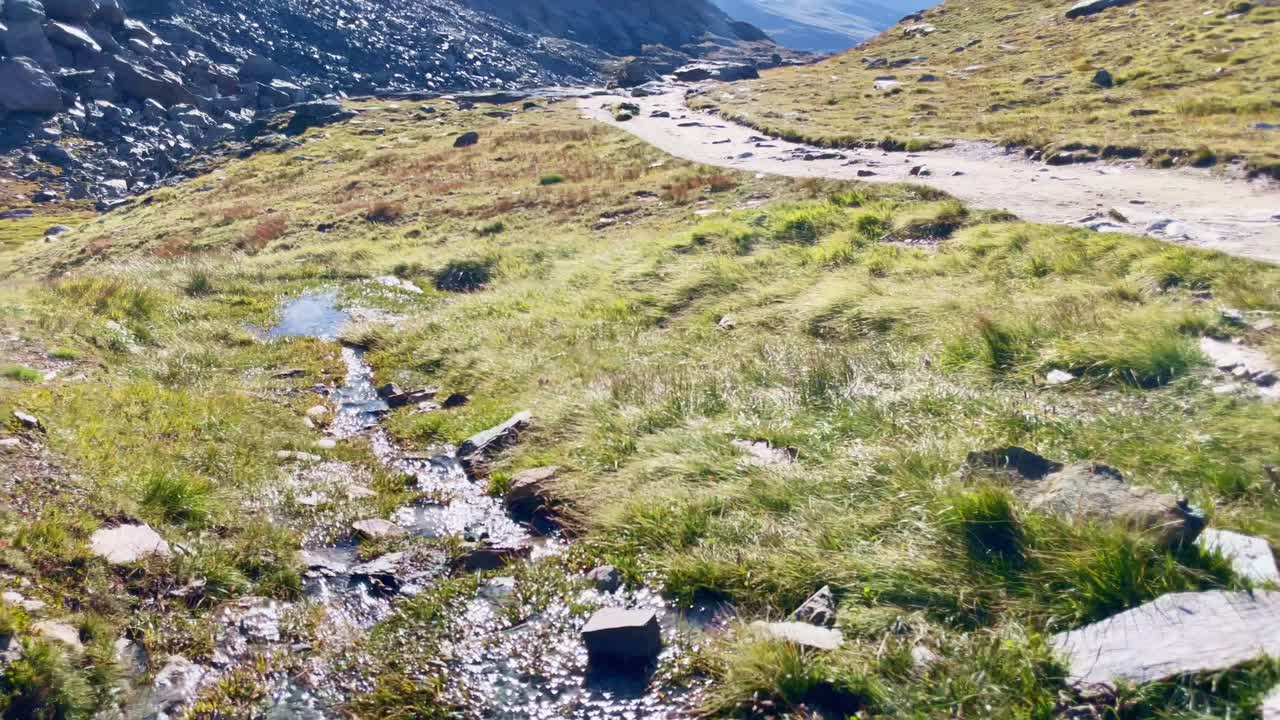 Mountain Freedom: Matterhorn Mountain Landscape Near Rotenboden and Gornergart, Switzerland, Europe | Rocks Near A Small Stream on Hillside