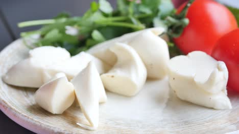 fresh mozzarella cheese with tomatoes and basil