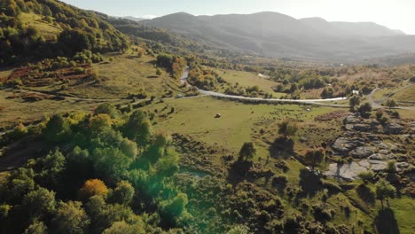 aerial wide shot of green valley at sunset-1