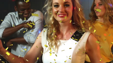 animation of confetti falling over happy group of friends dancing at party