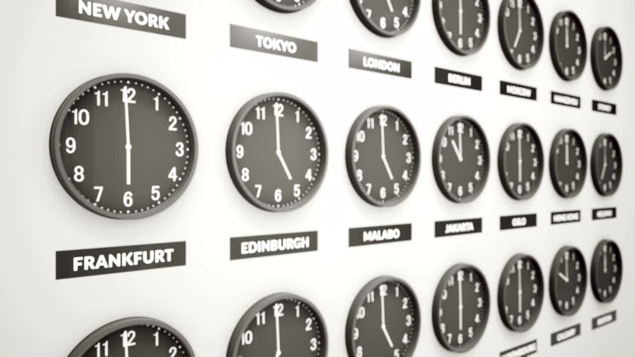 Round Clocks Show Time In Different Cities On White Wall. Symbol For Greenwich Mean Time. Clock Face Timelapse