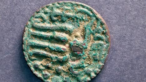 close up of very old coins