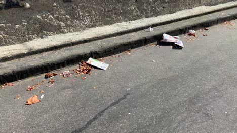 Trash-litter-flying-around-because-of-the-wind-in-the-streets