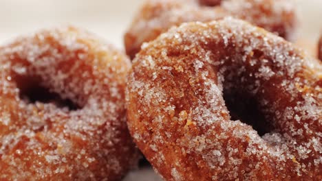 close-up of sugar-dusted donuts