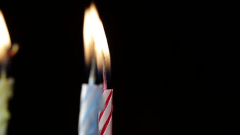 candles rotation on black background