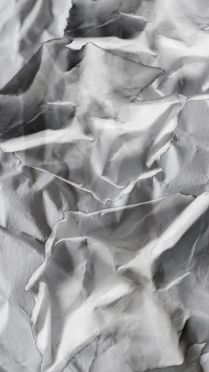 Abstract Moving Crumpled Paper Texture Background