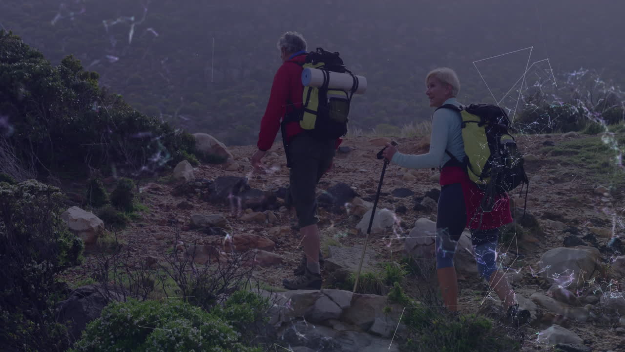 Travel marketing using senior hikers trekking uphill, with animated map icons and elevation graph