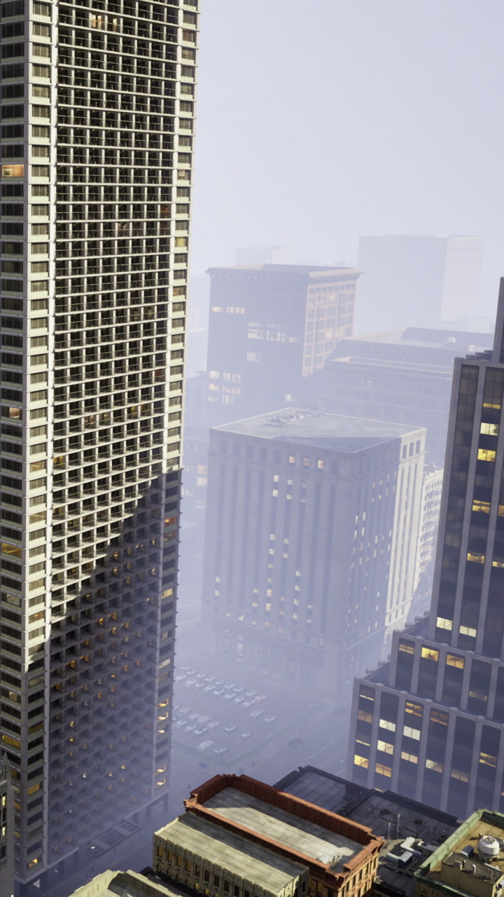 City buildings covered in fog during early morning hours in urban area