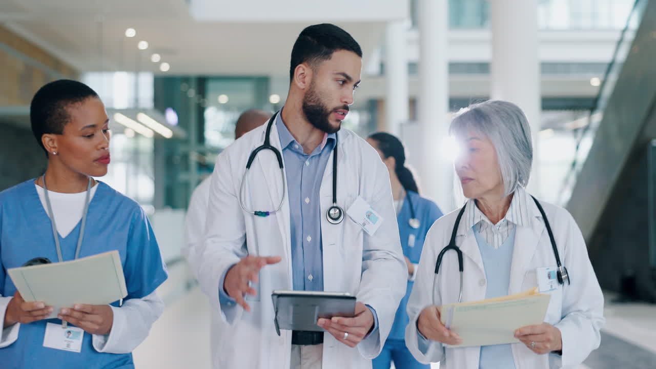Teamwork, medical and tablet with doctors