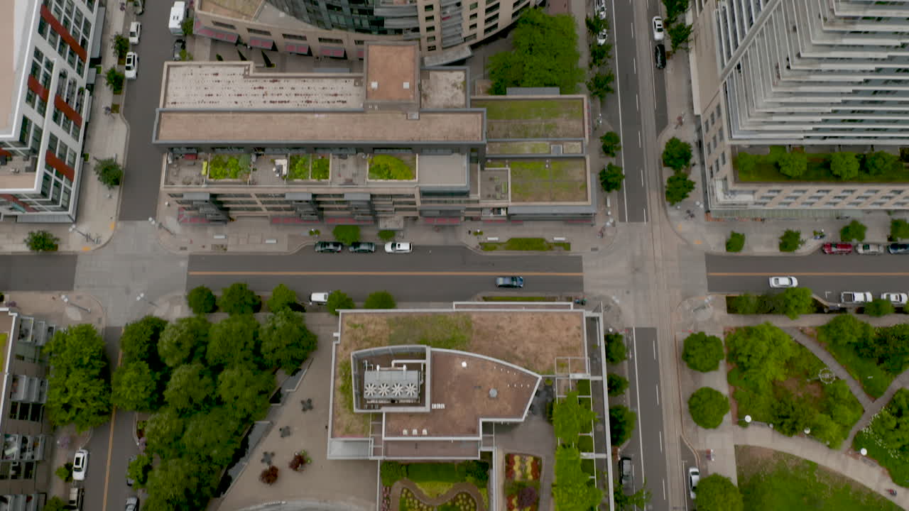dolly forward with slow tilt up over south waterfront buildings showing willamette river