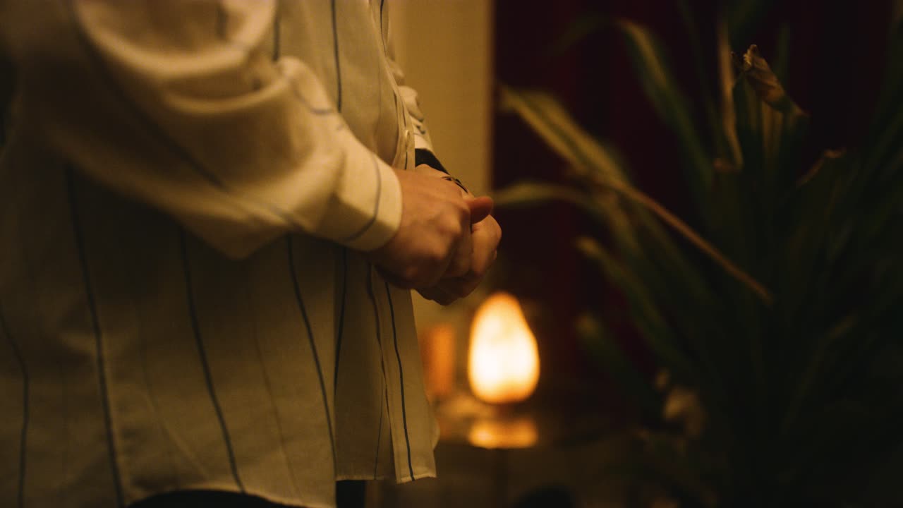 Man breaks glasses and throws them aside