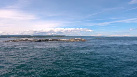 View-Of-Rocky-Outcrop-From-Marina-Pier-At-Victoria,-British-Columbia,-Canada