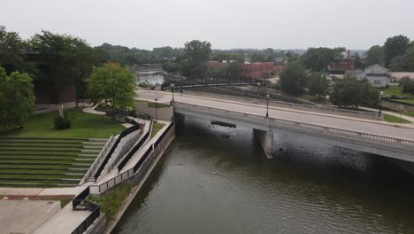 Flint-River-in-Flint,-Michigan-drone-shot-over-river-and-bridges