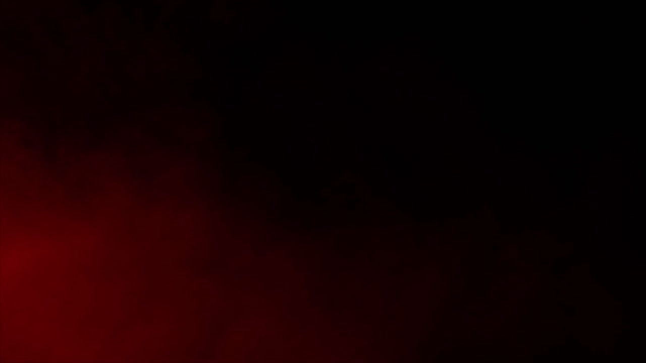 Red mist and blood swirls and flows slowly on a black background. Ideal overlay for bloody horror films, dramatic intros, atmosphere of danger or passion