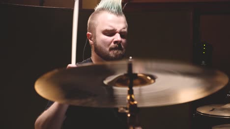 drummer performing in a studio setting