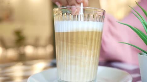 latte in a glass at a cafe