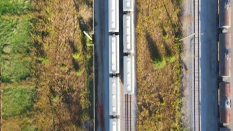 Freight-Wagons-At-Industrial-Rail-Yard-On-A-Sunny-Day