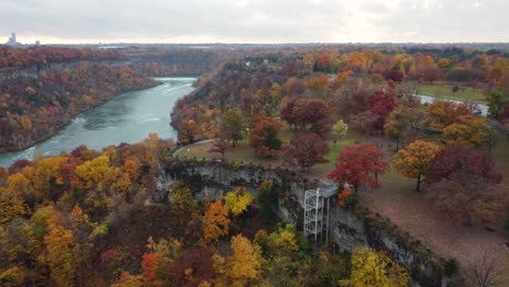 aerial view over niagara glen nature reserve and the river with the colors trees