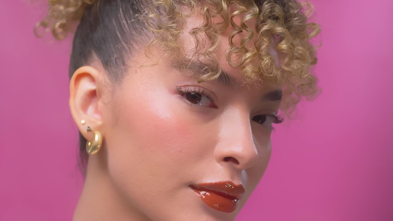 A curly girl with beautiful face and pink lips