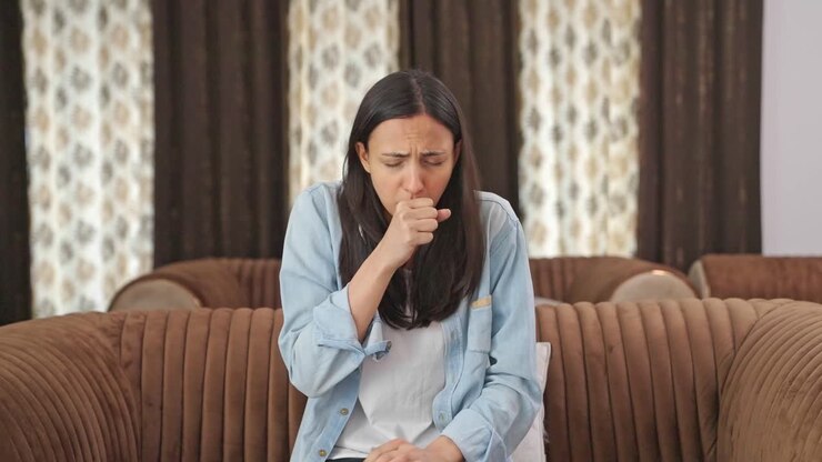 Indian woman having cold and cough