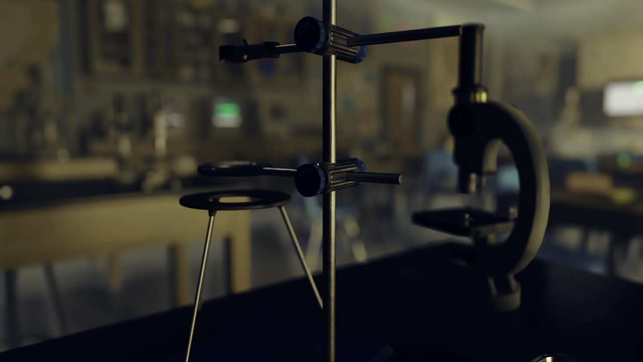 Laboratory equipment arranged on a table in a science classroom setting