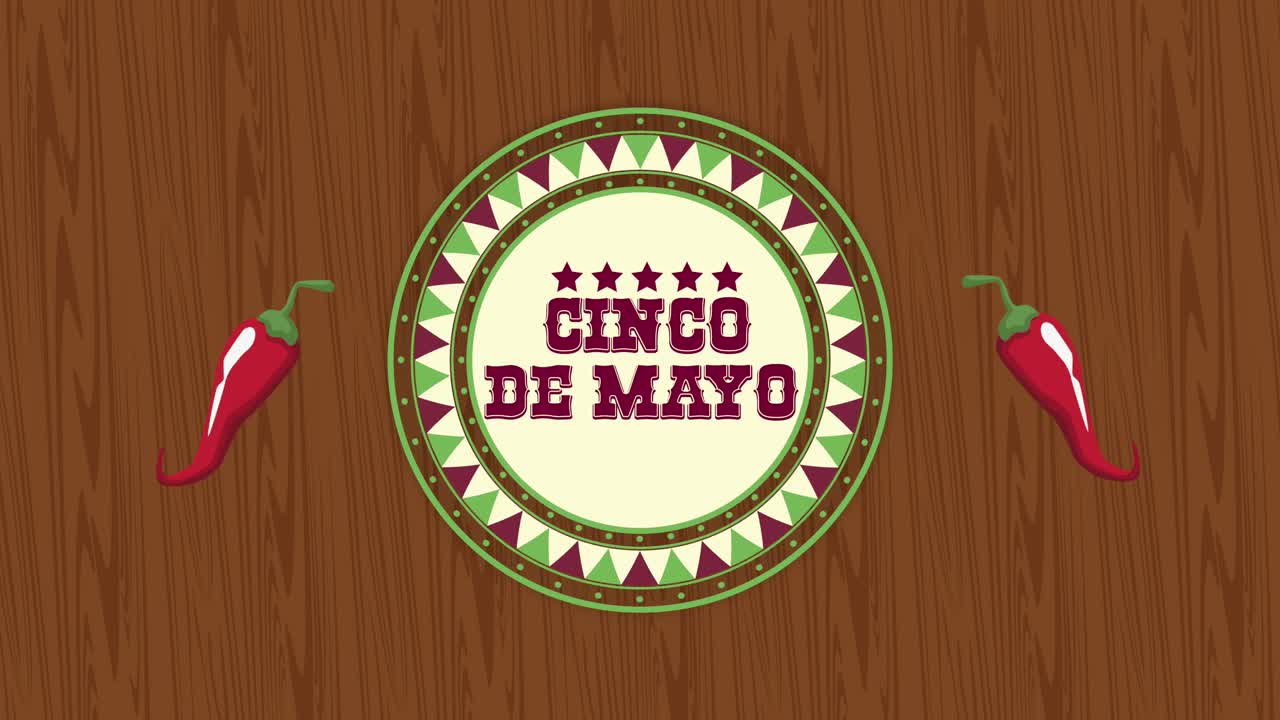 letras de cinco de mayo con pimientos de chile en fondo de madera