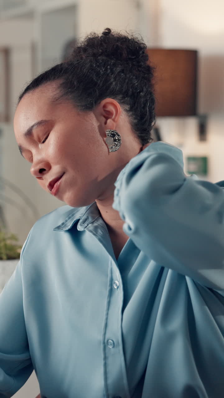 Woman Stretching Her Neck to Relieve Discomfort