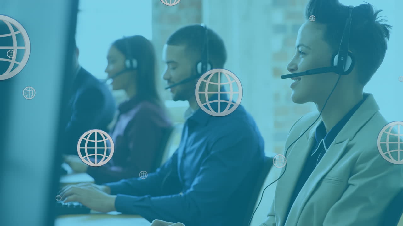 Animation of online globe icons over diverse business people wearing phone headsets