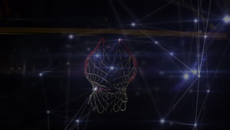 animation of networks of connections over biracial male basketball player at gym